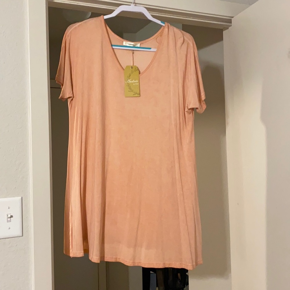 Andree by unit size medium peach top.
